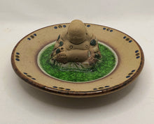 Last inn bildet i Galleri-visningsprogrammet, Skål med Buddha figur.
